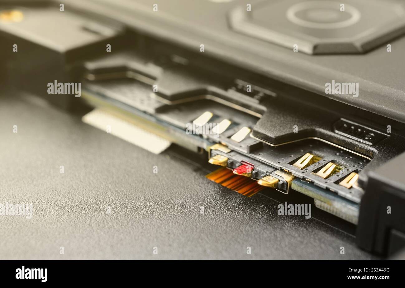 Broadband 5G mobile communication technology concept. Dual SIM card slot in modern smartphone. SIM stores international mobile subscriber identity Stock Photo