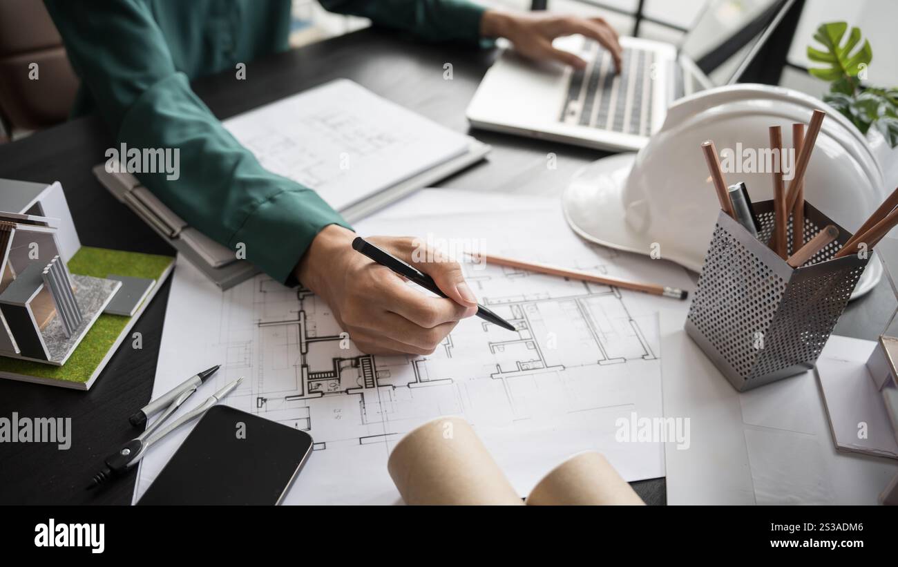 Architecture Man drawing on architectural Creative project business ...