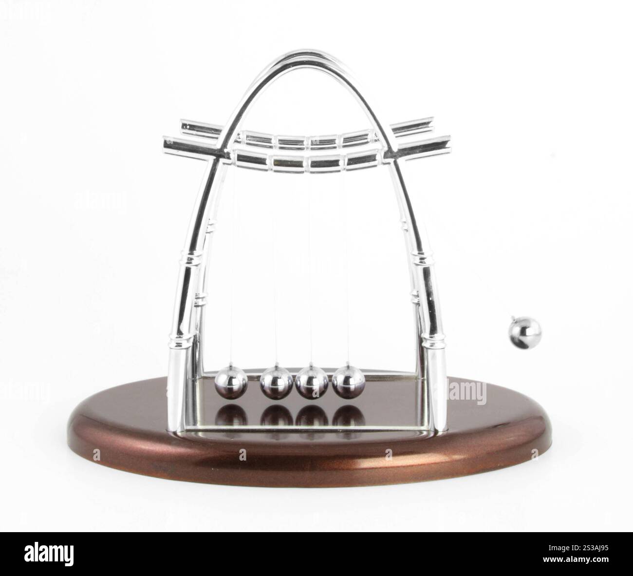 Newtons cradle isolated on white background. Newtons cradle isolated Stock Photo