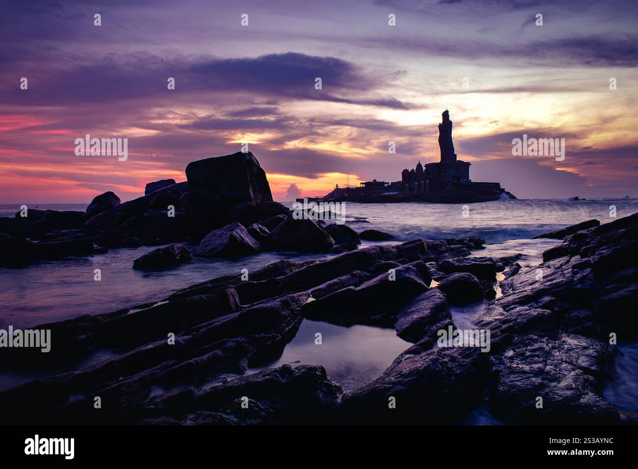 A stunning sunset view at Kanyakumari, featuring the iconic ...