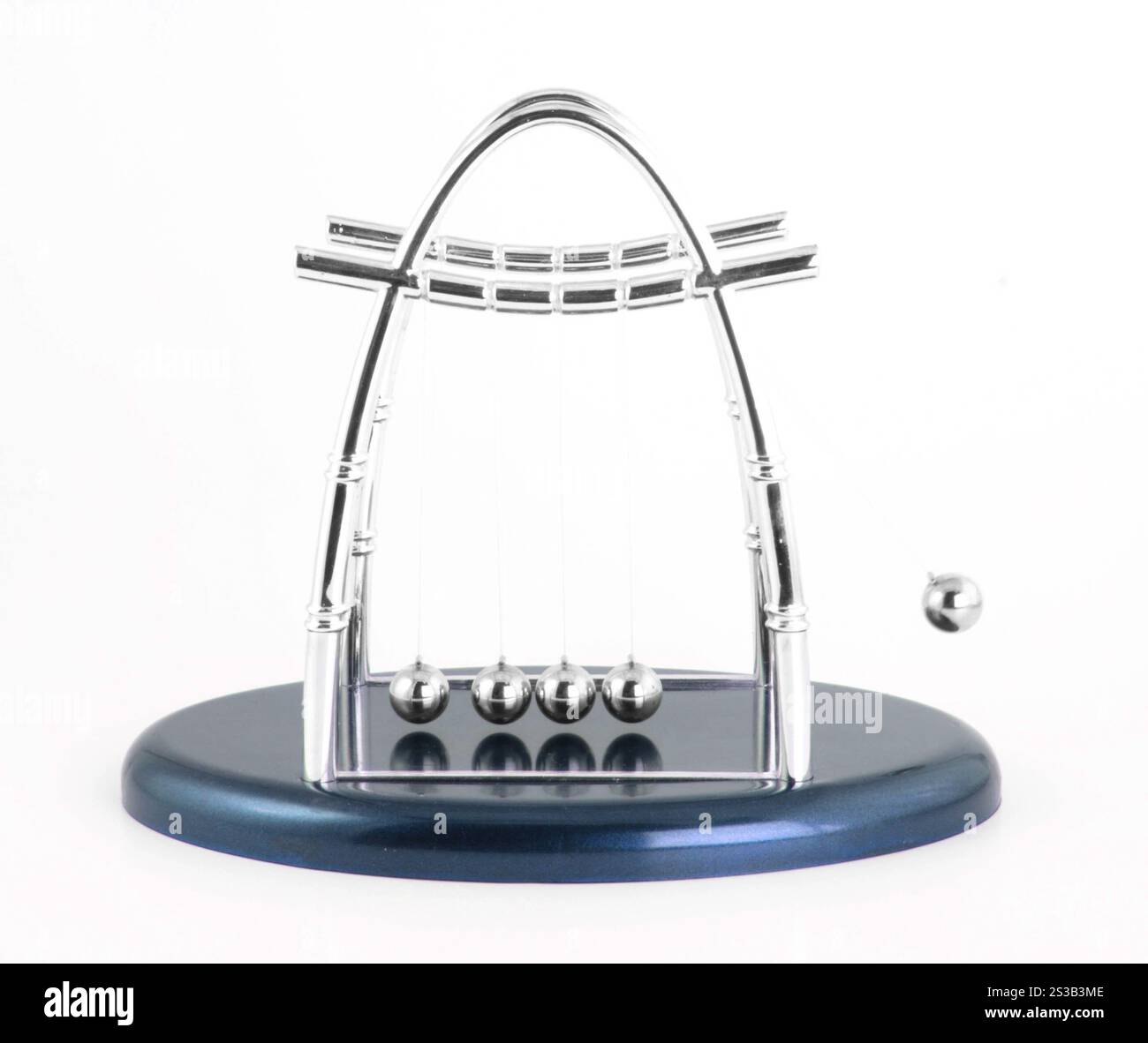 Newtons cradle isolated on white background. Newtons cradle isolated Stock Photo