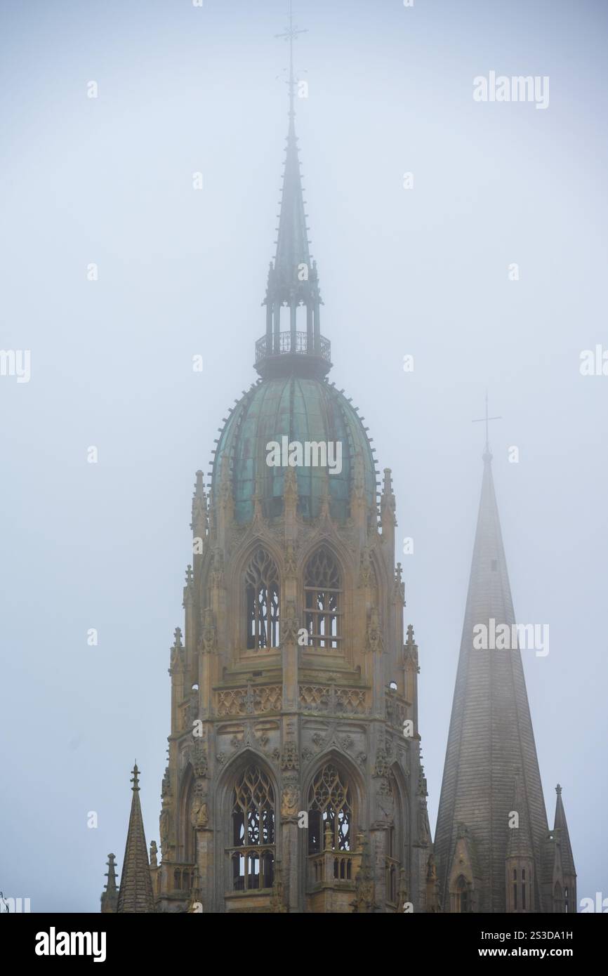 Bayeux Cathedral Central tower in fog, Normandy, France Stock Photo