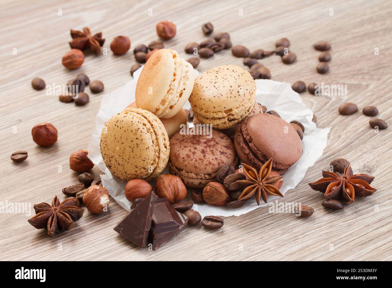 pile of chocolate macaroons on wooden table, color of the year 2025 ... pile of chocolate macaroons on wooden table, color of the year 2025 ...