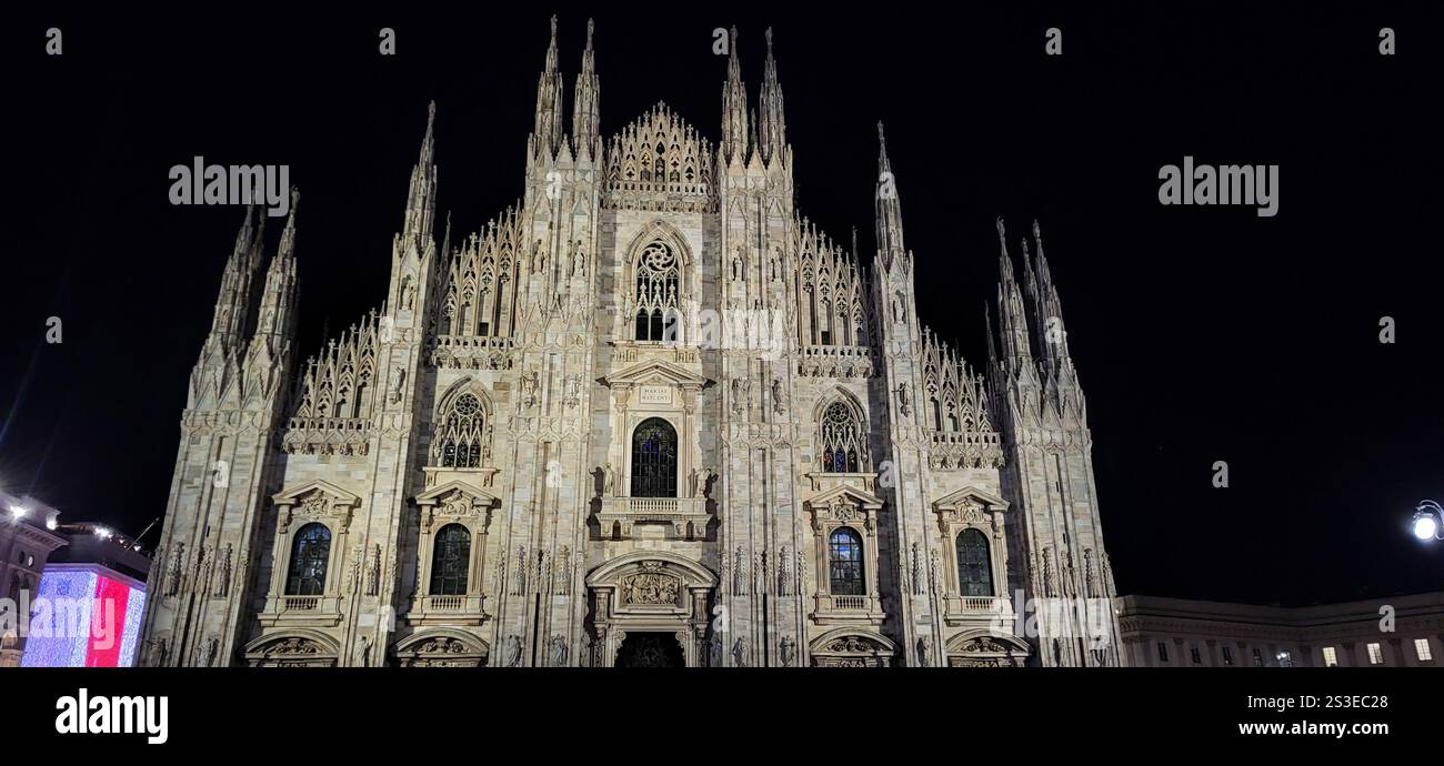 Milan Cathedral Illuminated at Night - Smartphone Captured Stock Image