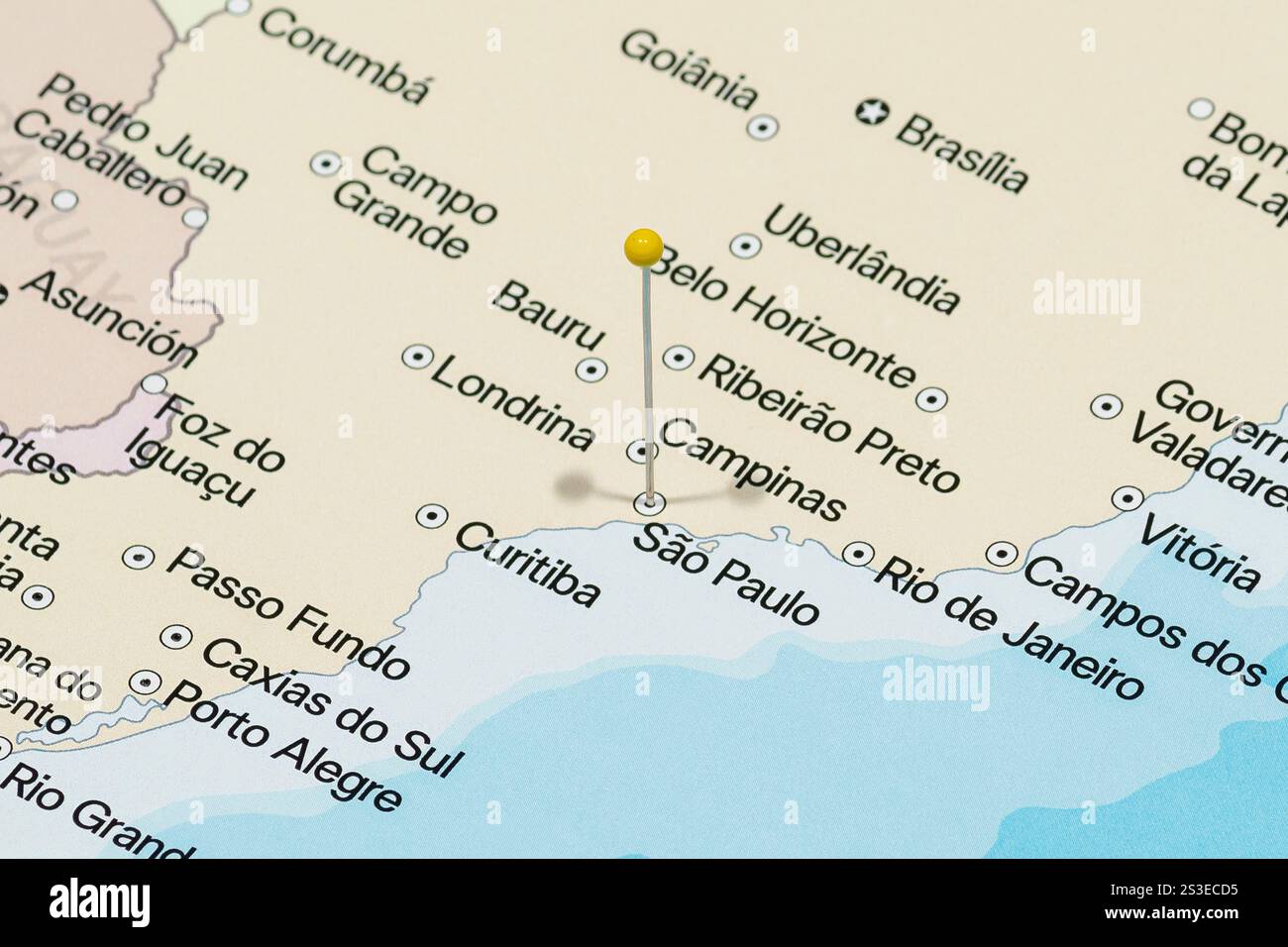 Macro photo of a yellow pin needle into São Paulo city of Brazil ...