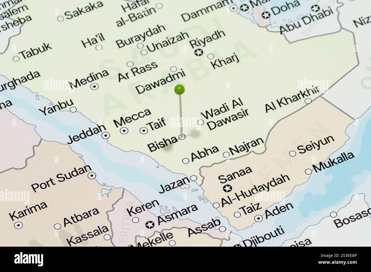 Macro photo of a green pin needle into Bisha city of Saudi Arabia ...