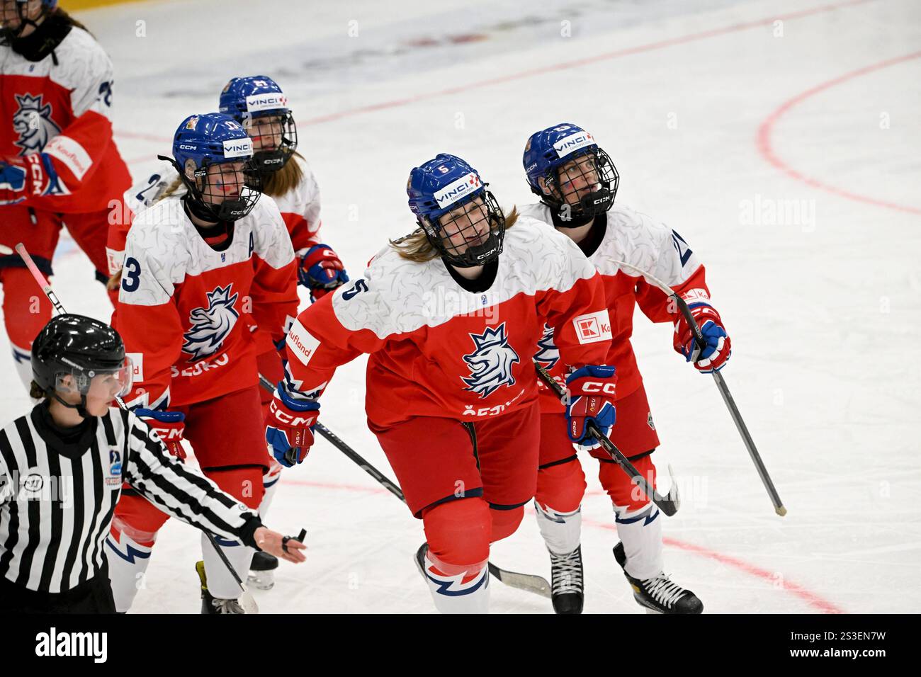 Adela Fromova of Czechia (5) and team members celebrating their first