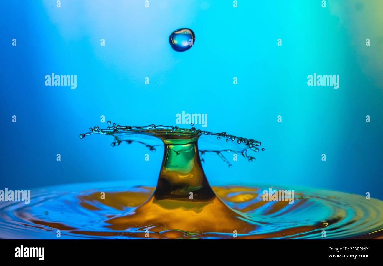 Arresting, ethereal, colour infused, imaginative water collision, macro ...