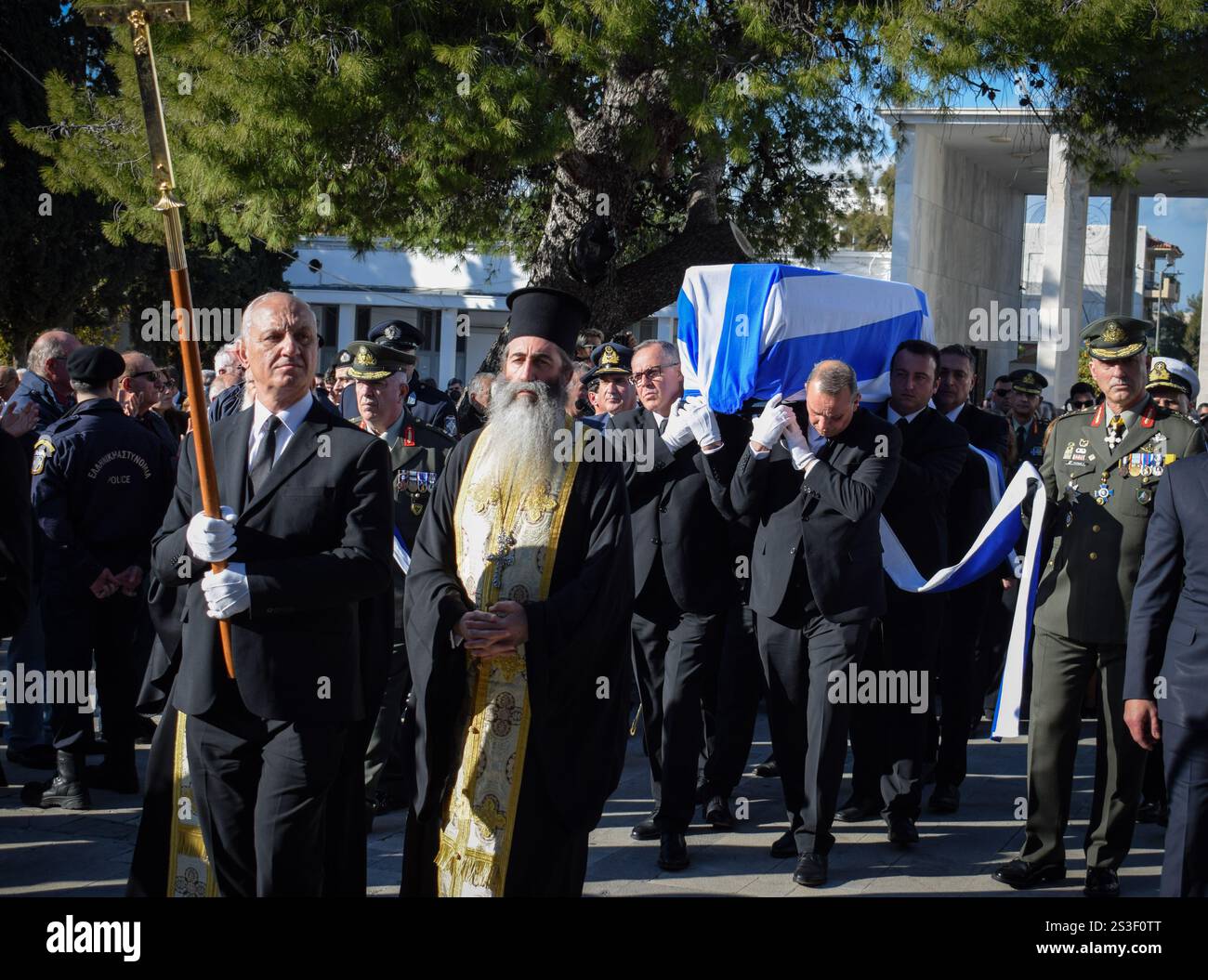 Athens, Greece. 9 January 2025. Pallbearers carry the coffin of former