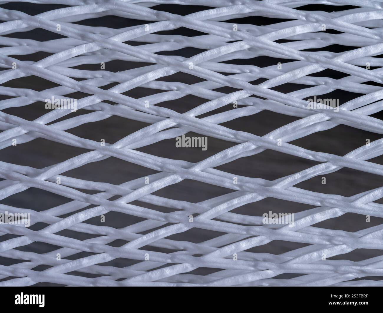 Foam mesh packaging for wine bottles. Close up. Stock Photo