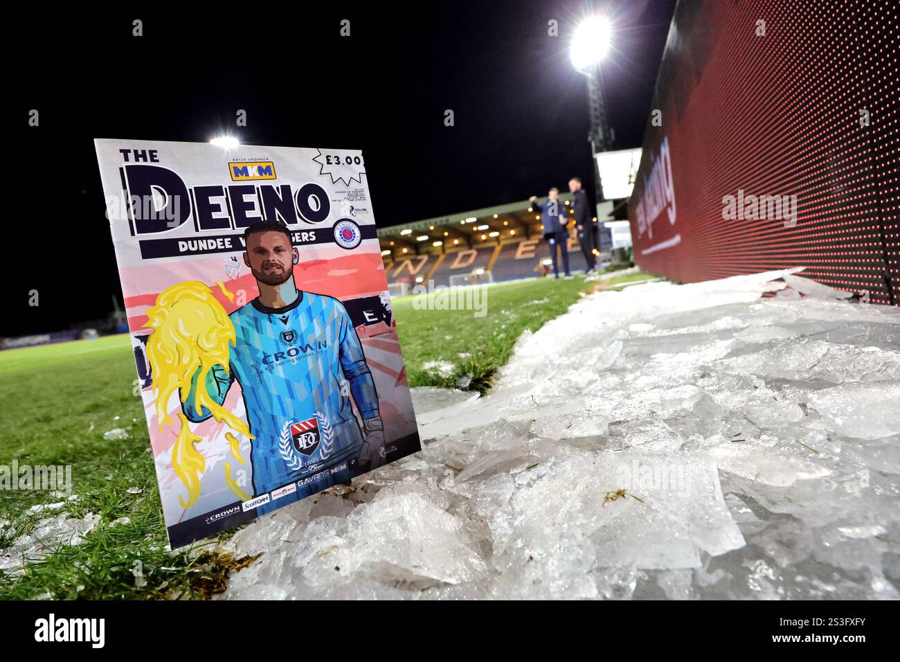 A general view of a the match day programme next to piles of ice before