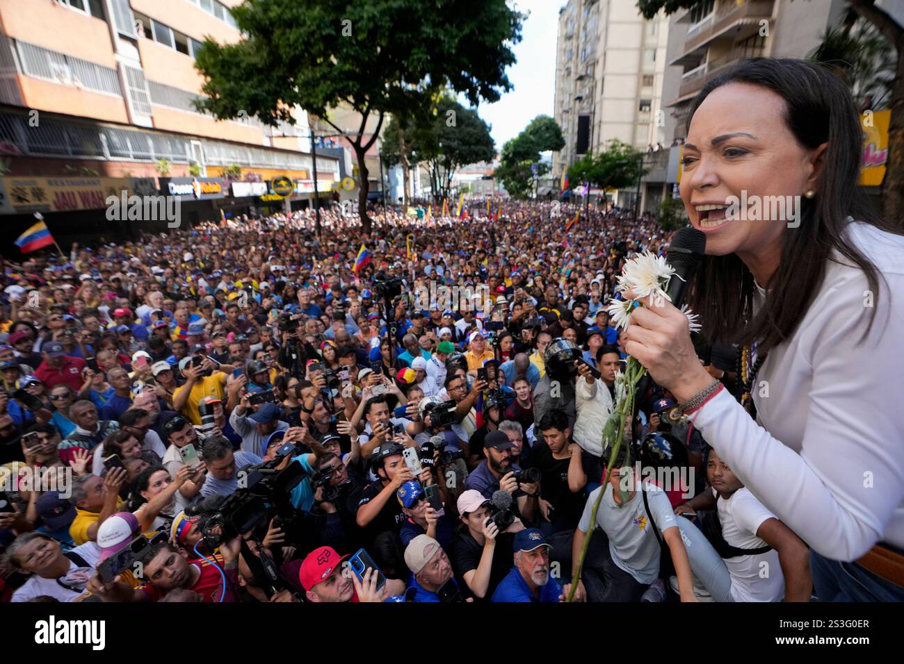 Opposition leader Maria Corina Machado addresses supporters during a