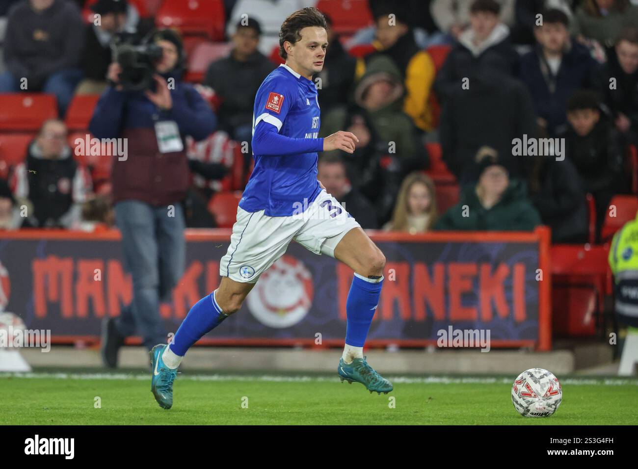 Perry Ng of Cardiff City breaks with the ball during the Emirates FA