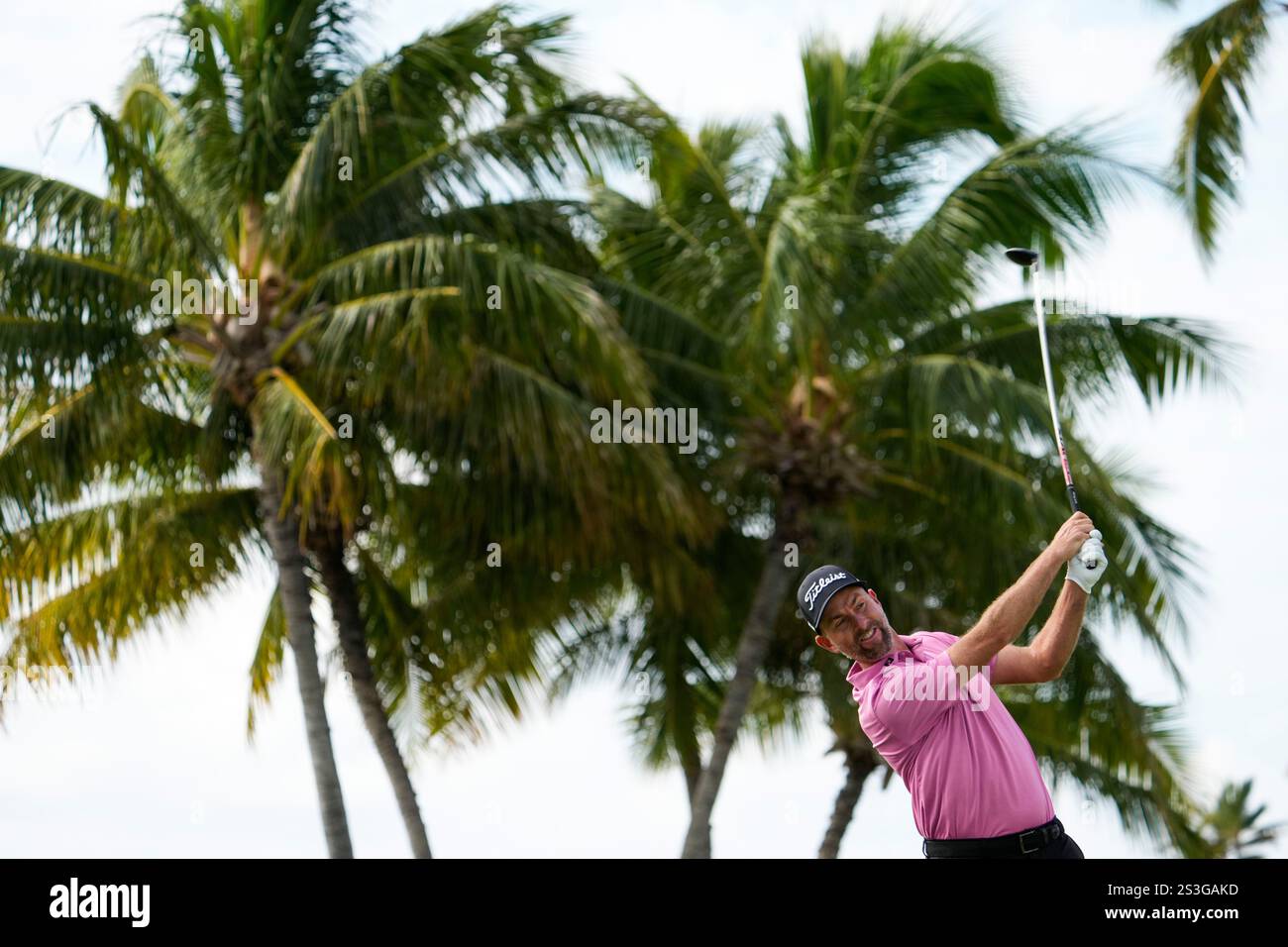 Webb Simpson hits on the 14th hole during the first round of the Sony