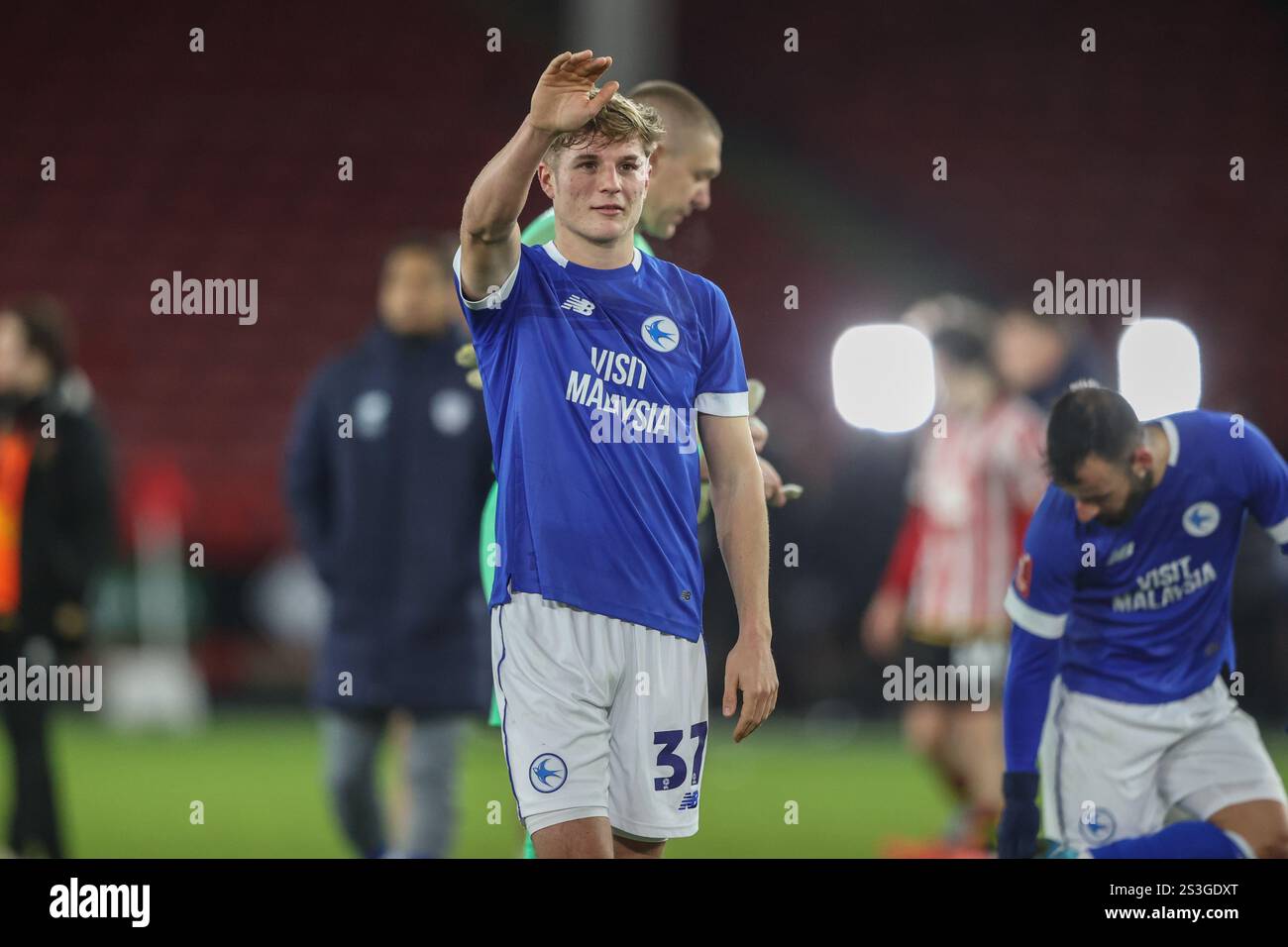 Tom Davies of Cardiff City waves to the fans after the game during the