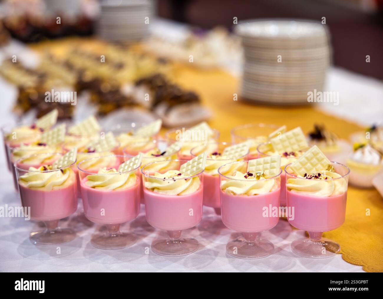 strawberry with white chocolate mousse , cake mini patisserie Dark chocolate eclairs. Soft, decadent, patisserie, Stock Photo