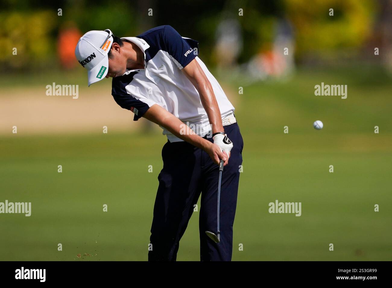 Rikuya Hoshino, of Japan, hits on the 16th hole during the first round