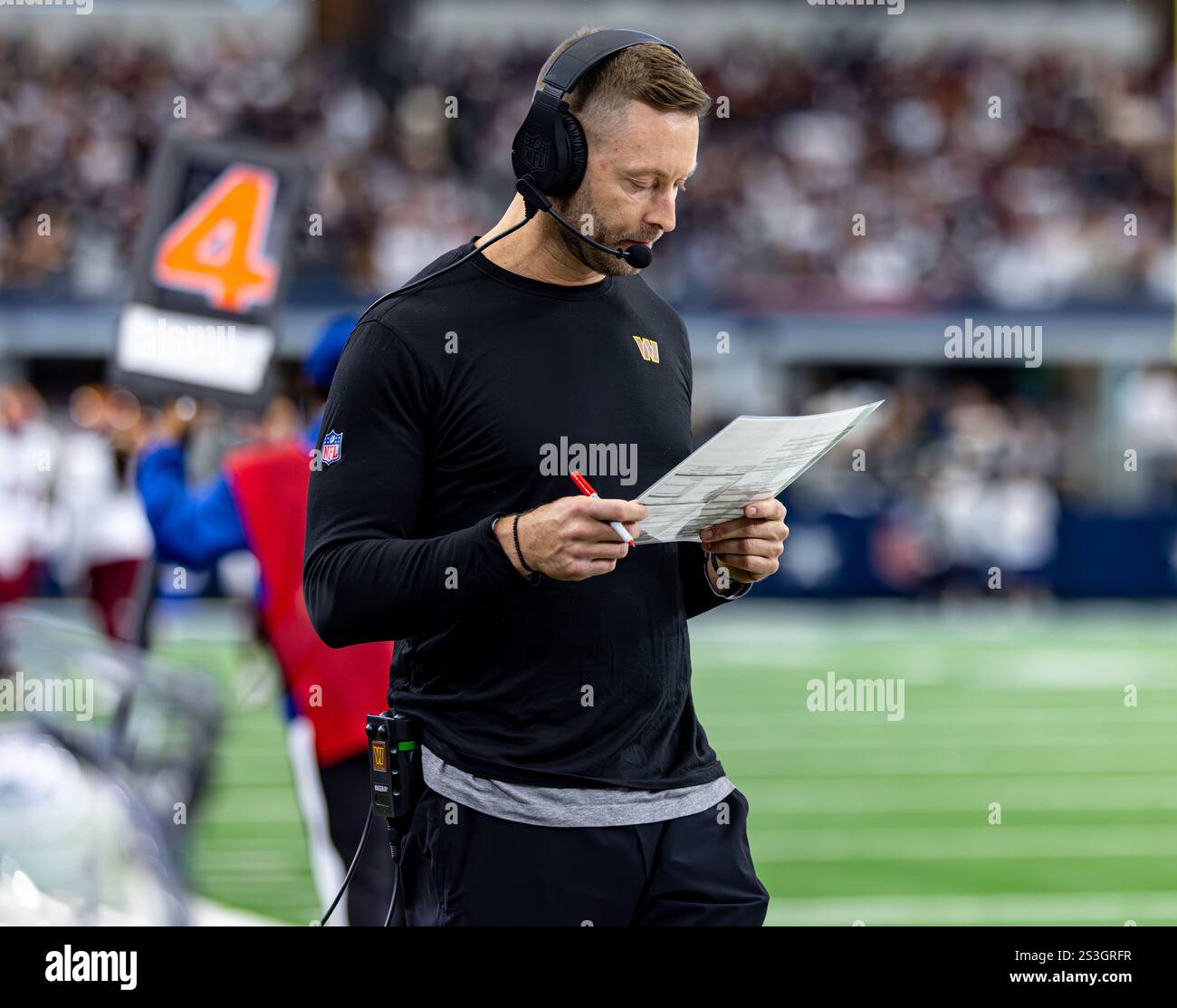 Washington Commanders offensive coordinator Kliff Kingsbury calling the