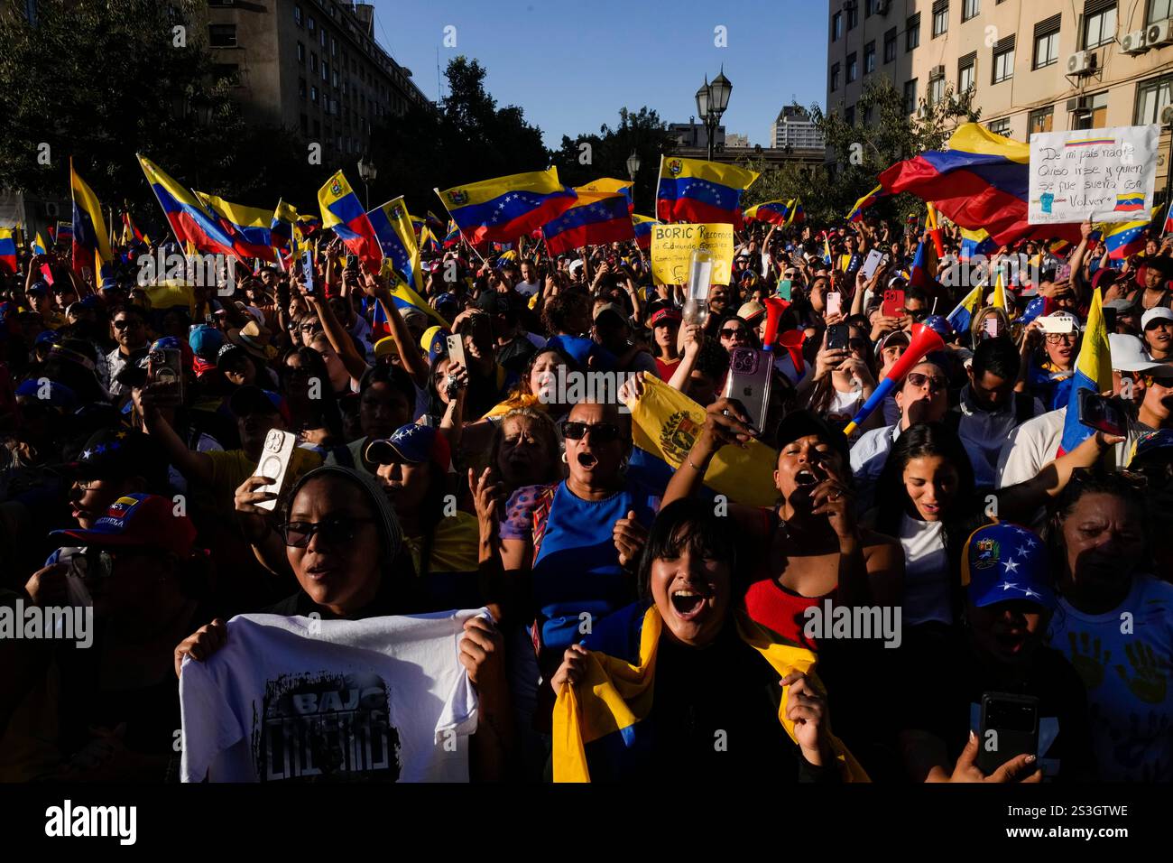 Opponents of Venezuelan President Nicolas Maduro participate in a