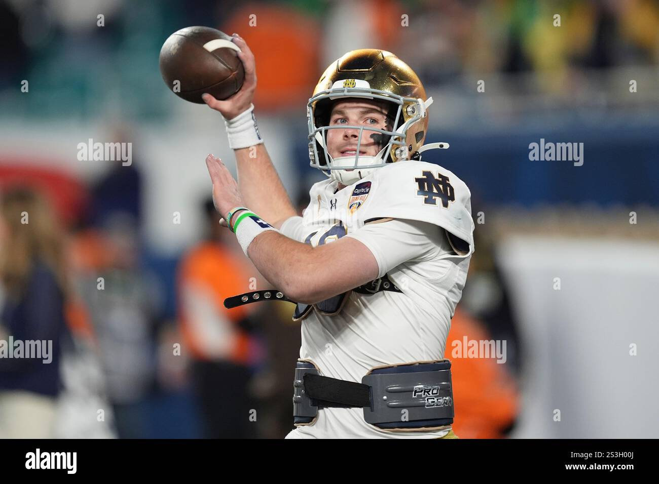 Notre Dame quarterback Riley Leonard (13) warms up before Orange Bowl
