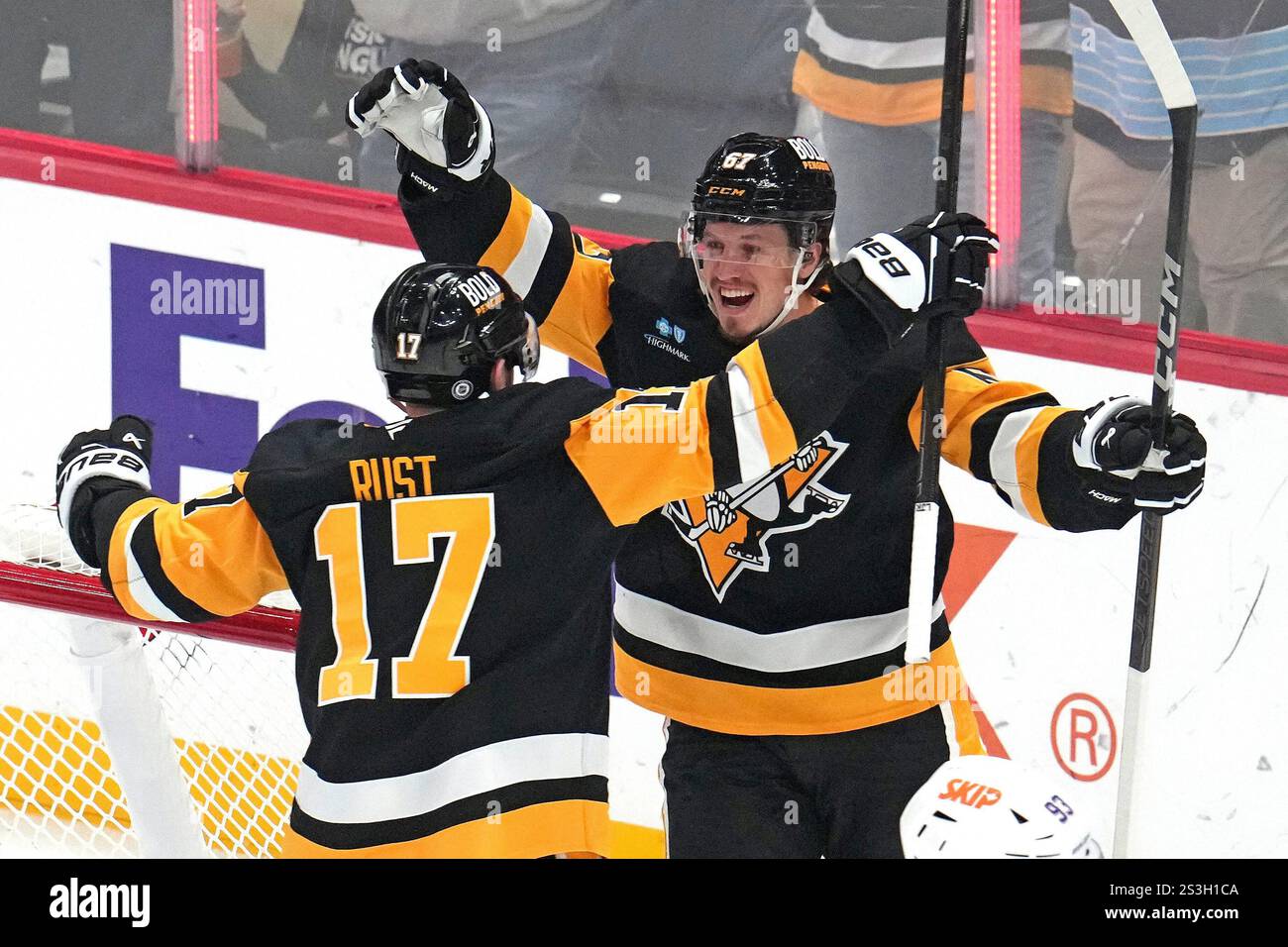 Pittsburgh Penguins' Rickard Rakell celebrates his goal with Bryan Rust ...
