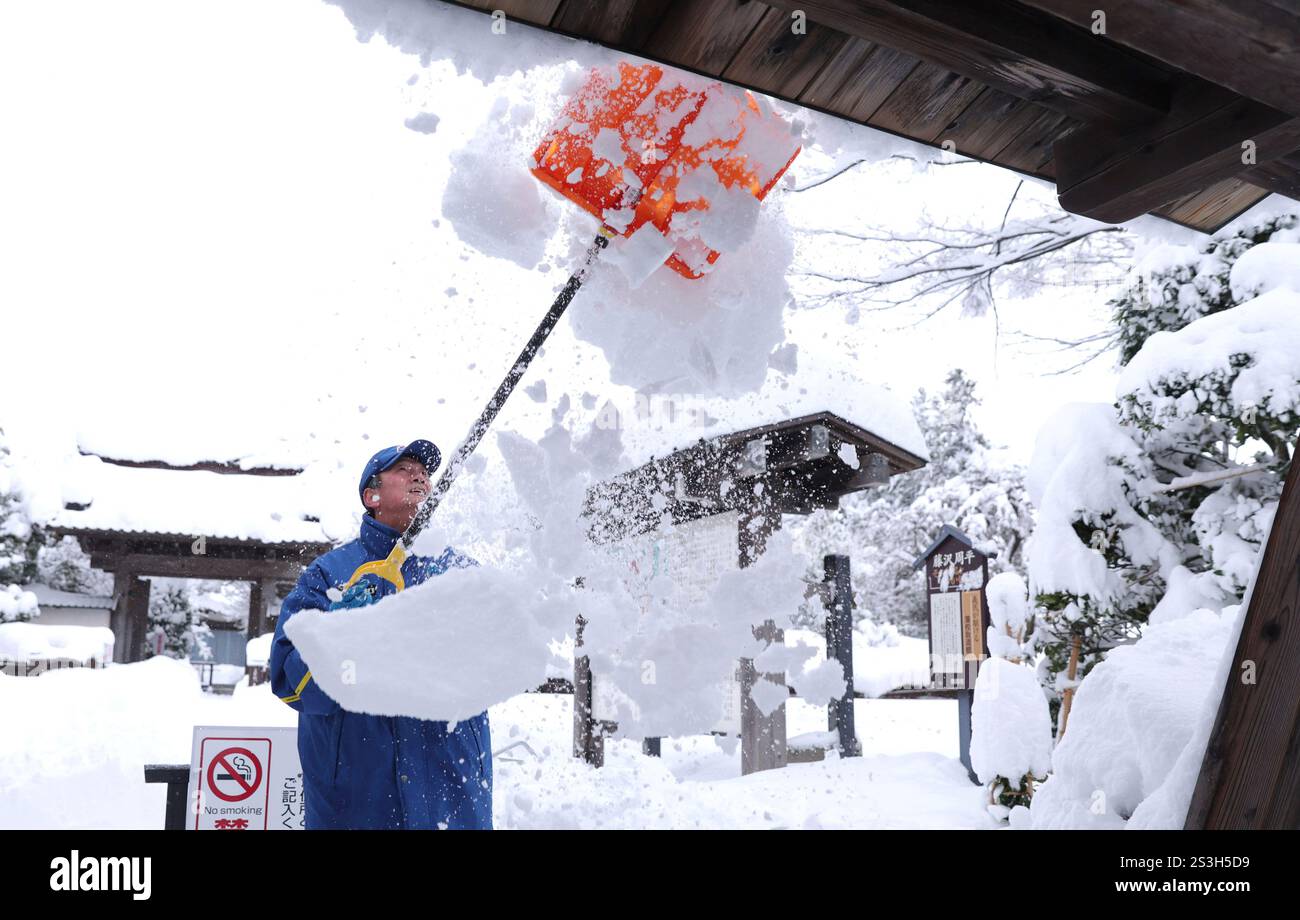An employee removes snow at a facility in Tsuruoka City, Yamagata