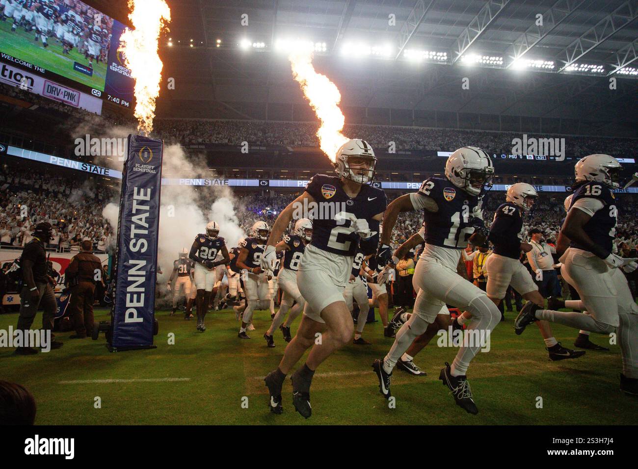 Penn State exits the tunnel before the 2025 Capital One Orange Bowl; an