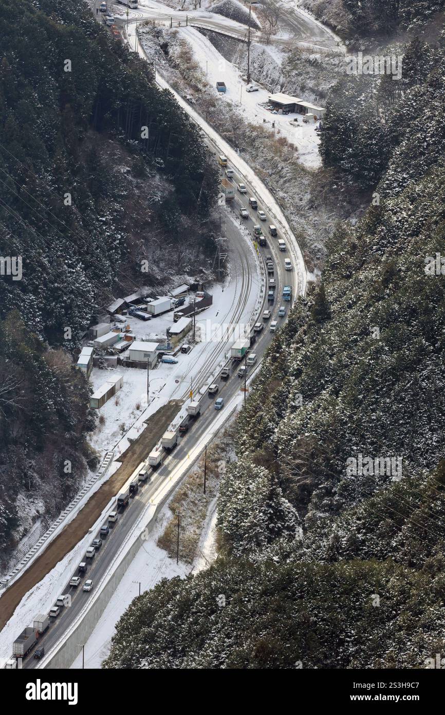 An aerial photo shows traffic congestion caused by snow in Takatori