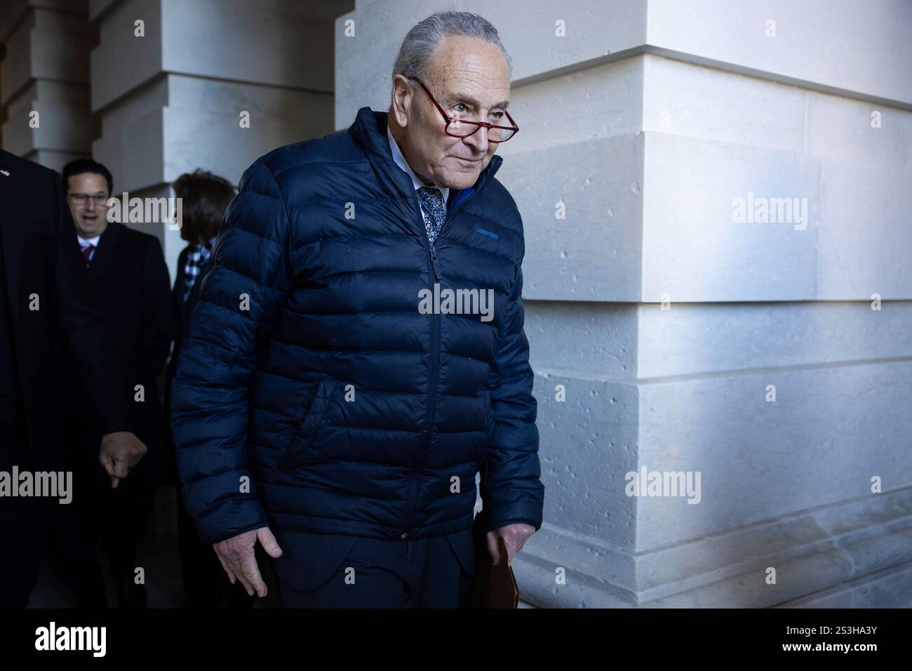 Senate Minority Leader Chuck Schumer (D-N.Y.) walks to a press ...