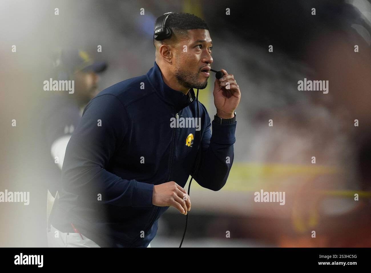 Notre Dame head coach Marcus Freeman looks up during the first half of