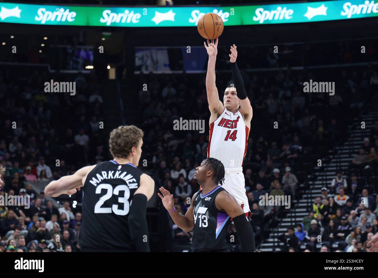 Miami Heat guard Tyler Herro (14) shoots a 3point basket over Utah