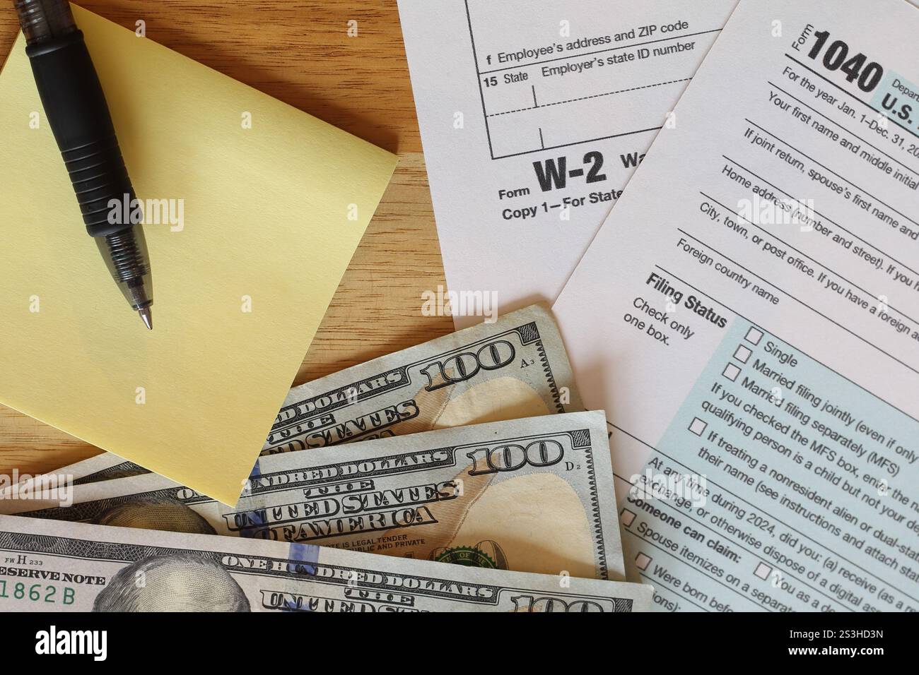 IRS 1040 and W-2 tax forms, close up, top down view Stock Photo