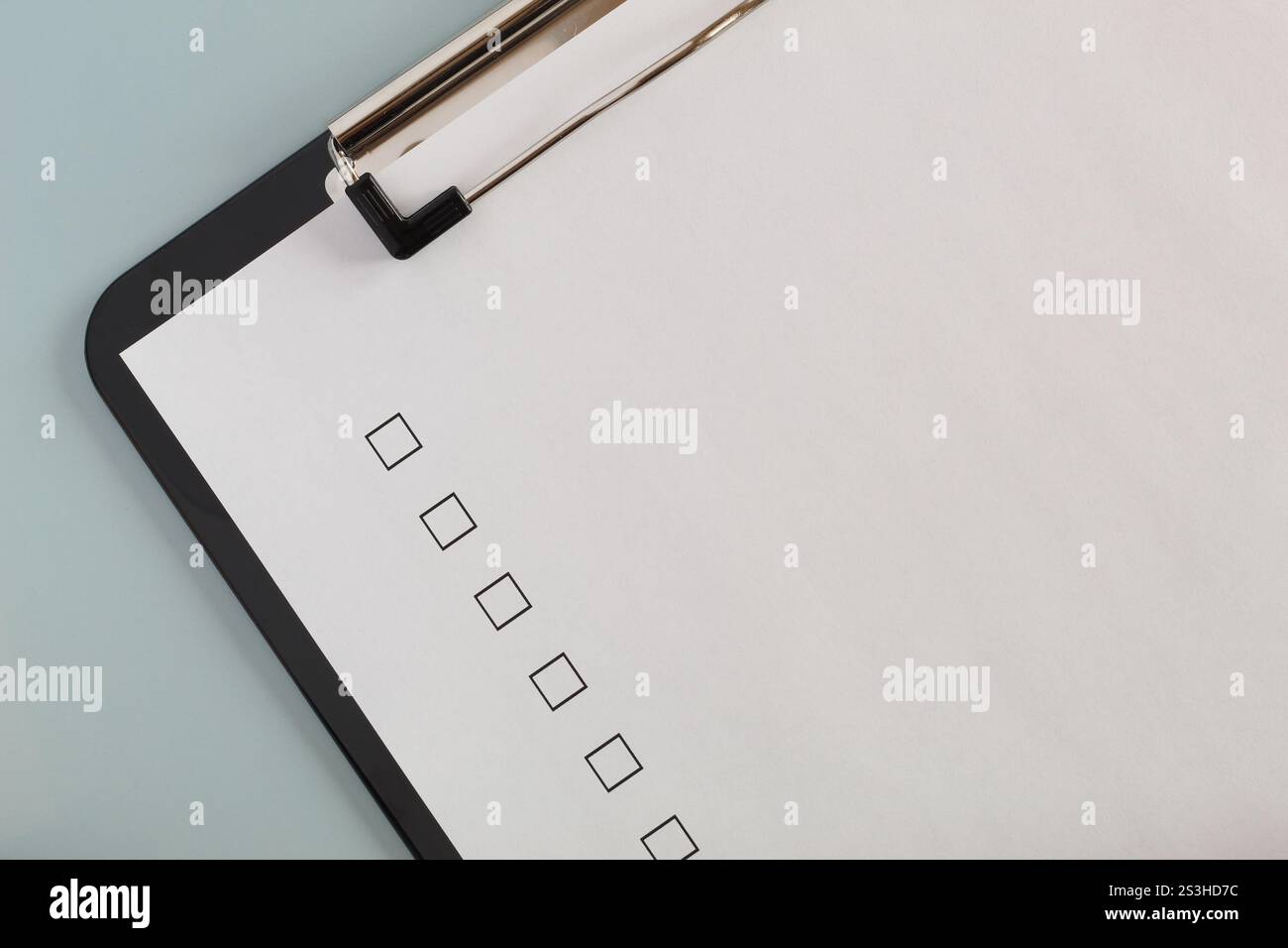 Checklist boxes close up on white paper, unchecked Stock Photo