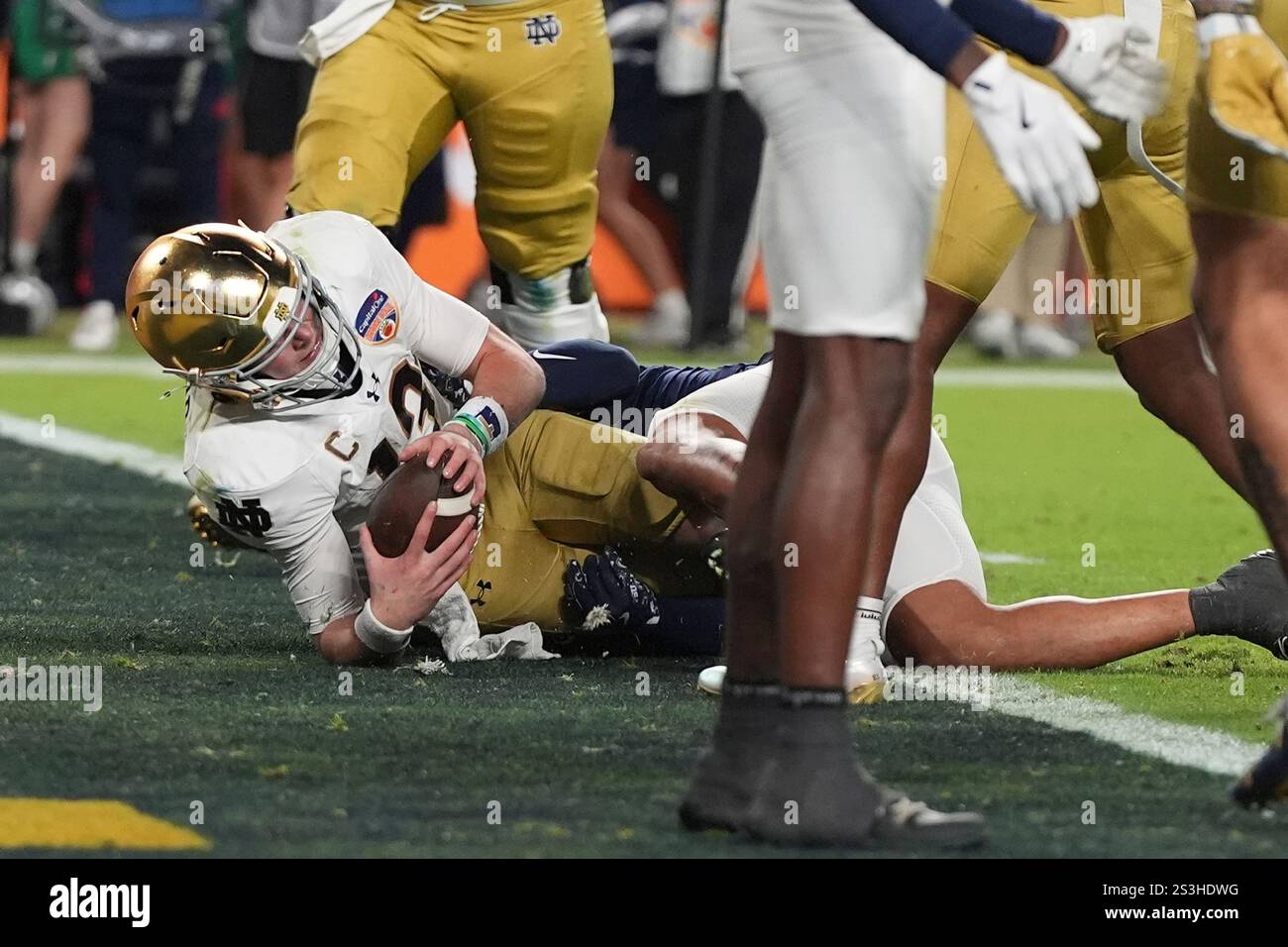 Notre Dame quarterback Riley Leonard (13) scores a touchdown during the