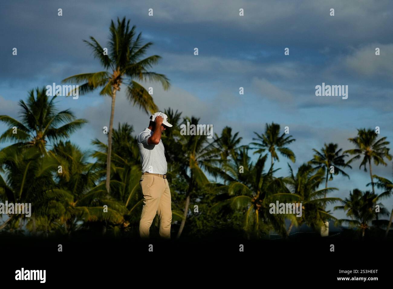 Corey Connors, of Canada, reacts after missing a shot on the 17th hole