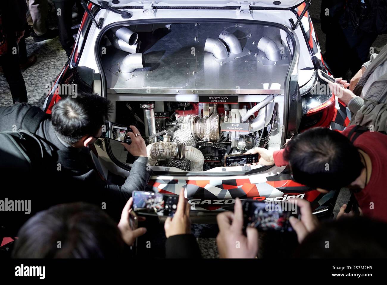 Visitors look at Toyota GR Yaris M Concept 2L Turbo Midship Sports Car ...
