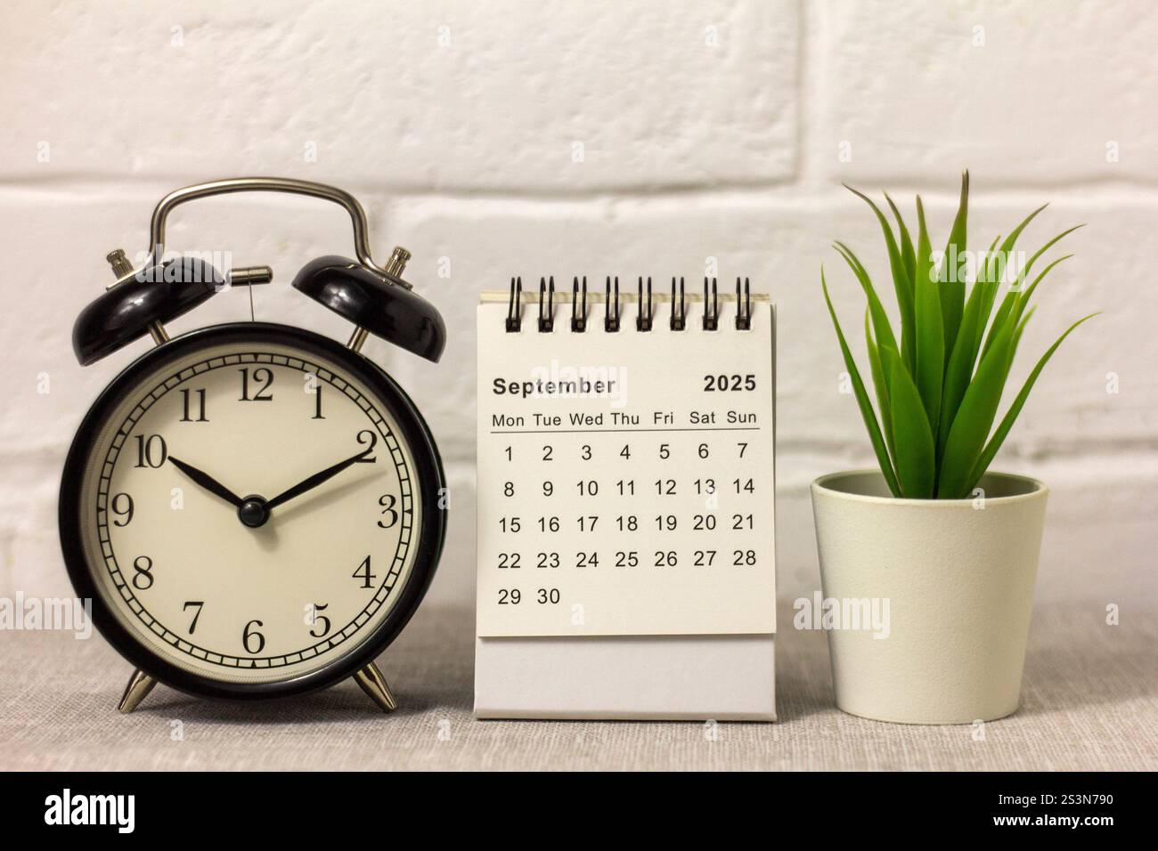 September 2025 alarm clock and desk calendar for planning on your ...
