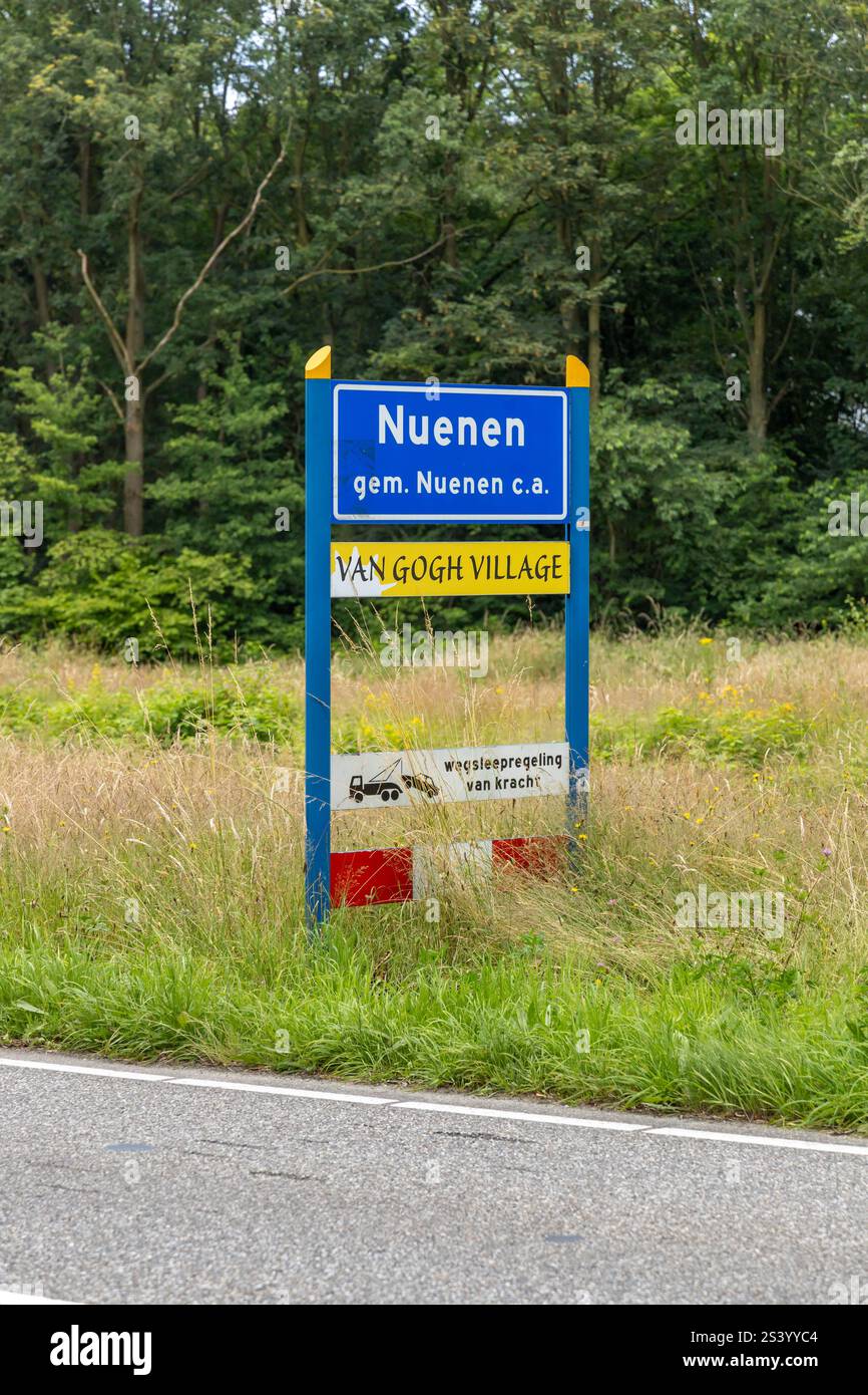 Nuenen, the Netherlands. 22 June 2024. Nuenen sign along the road when you enter the city with 'van gogh village' sign under it. Stock Photo