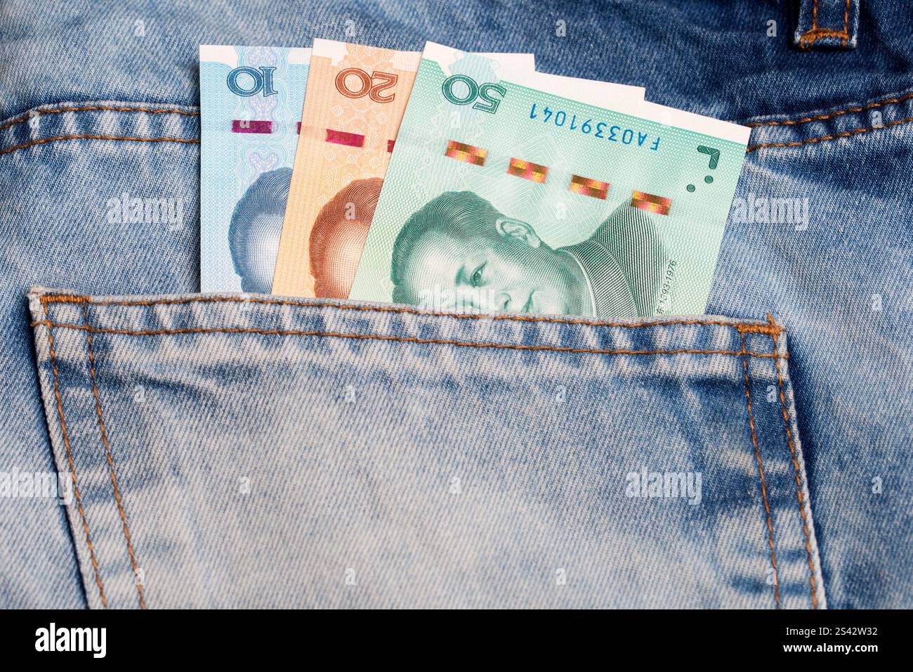 China money in pocket hi-res stock photography and images - Alamy
