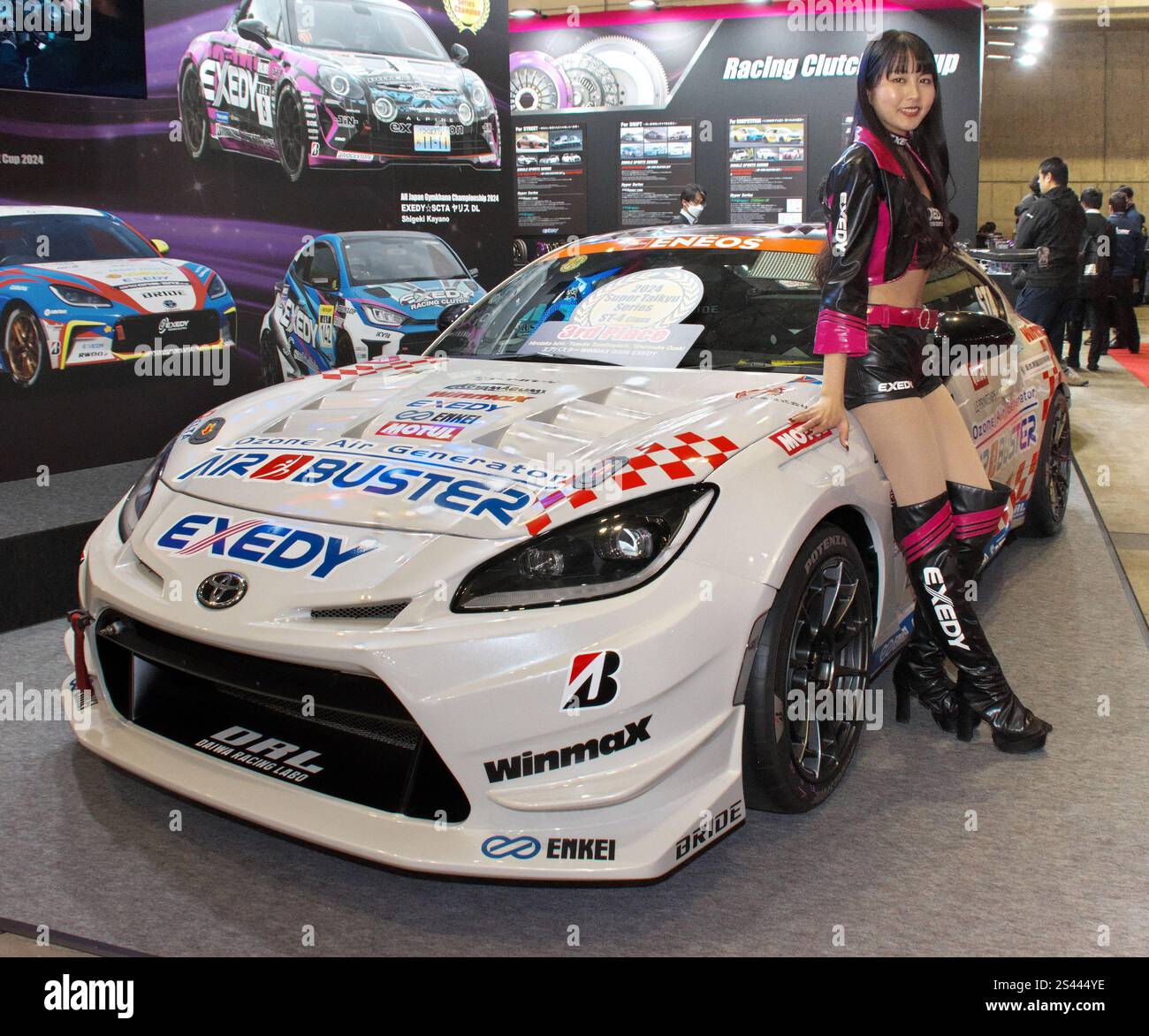 A model poses for photographers during the 