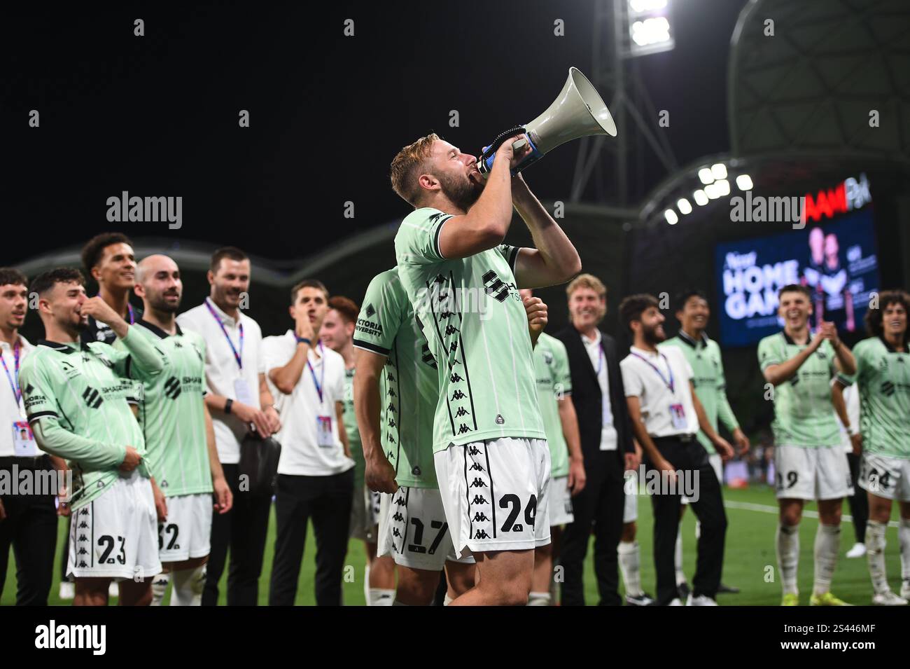 MELBOURNE, AUSTRALIA. 10th Jan 2025. Pictured: Western United forward Michael Ruhs chants into a megaphone towards the celebrating Western United travelling supporters after United secured 4-3 win at the end of the ISUZU A League Round 13 match, Melbourne Victory vs Western United at AAMI Park, Melbourne, Australia on 10th January 2025. Credit: Karl Phillipson / Alamy Live News Stock Photo