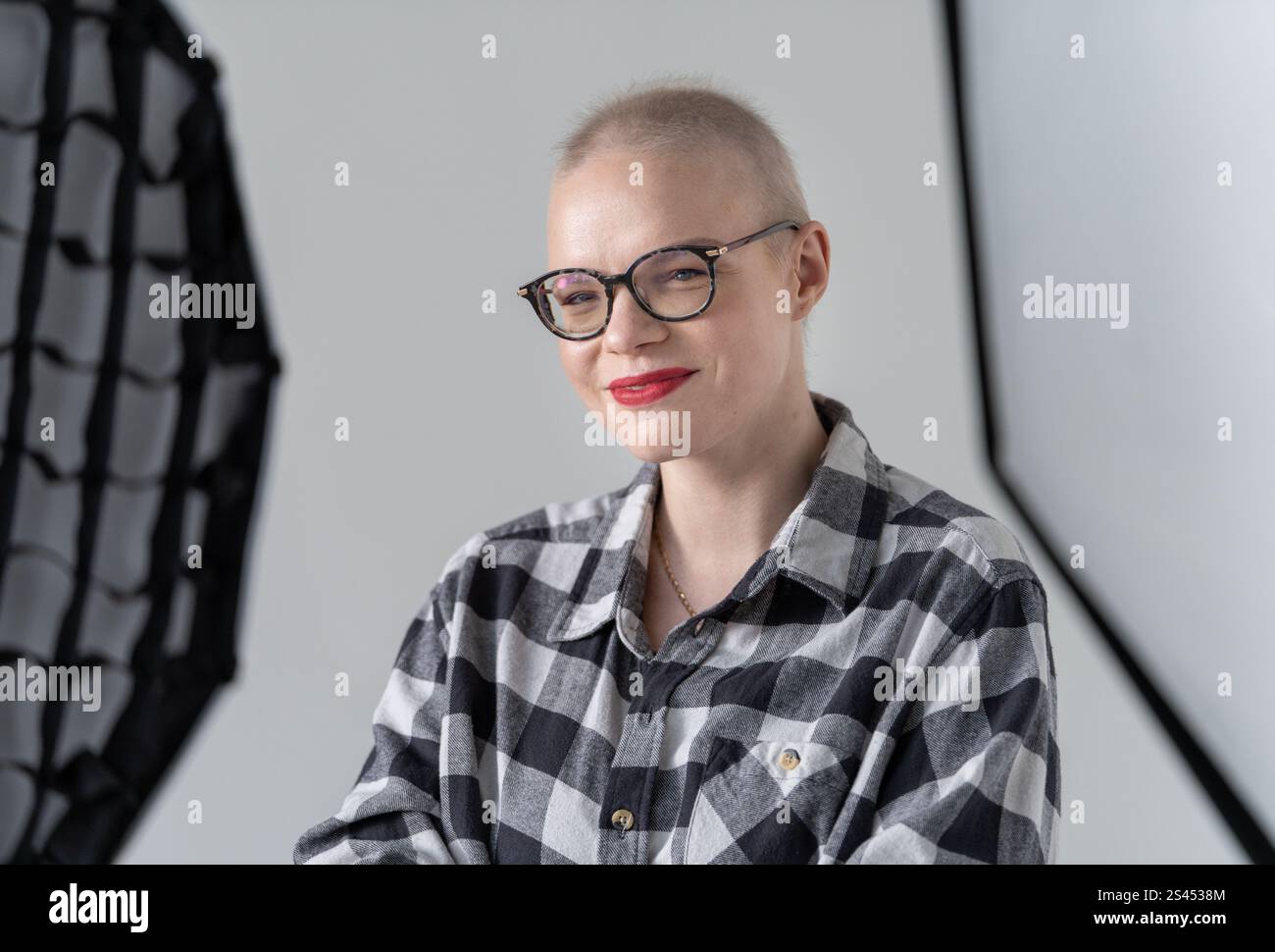 Casual woman wearing plaid hi-res stock photography and images - Alamy
