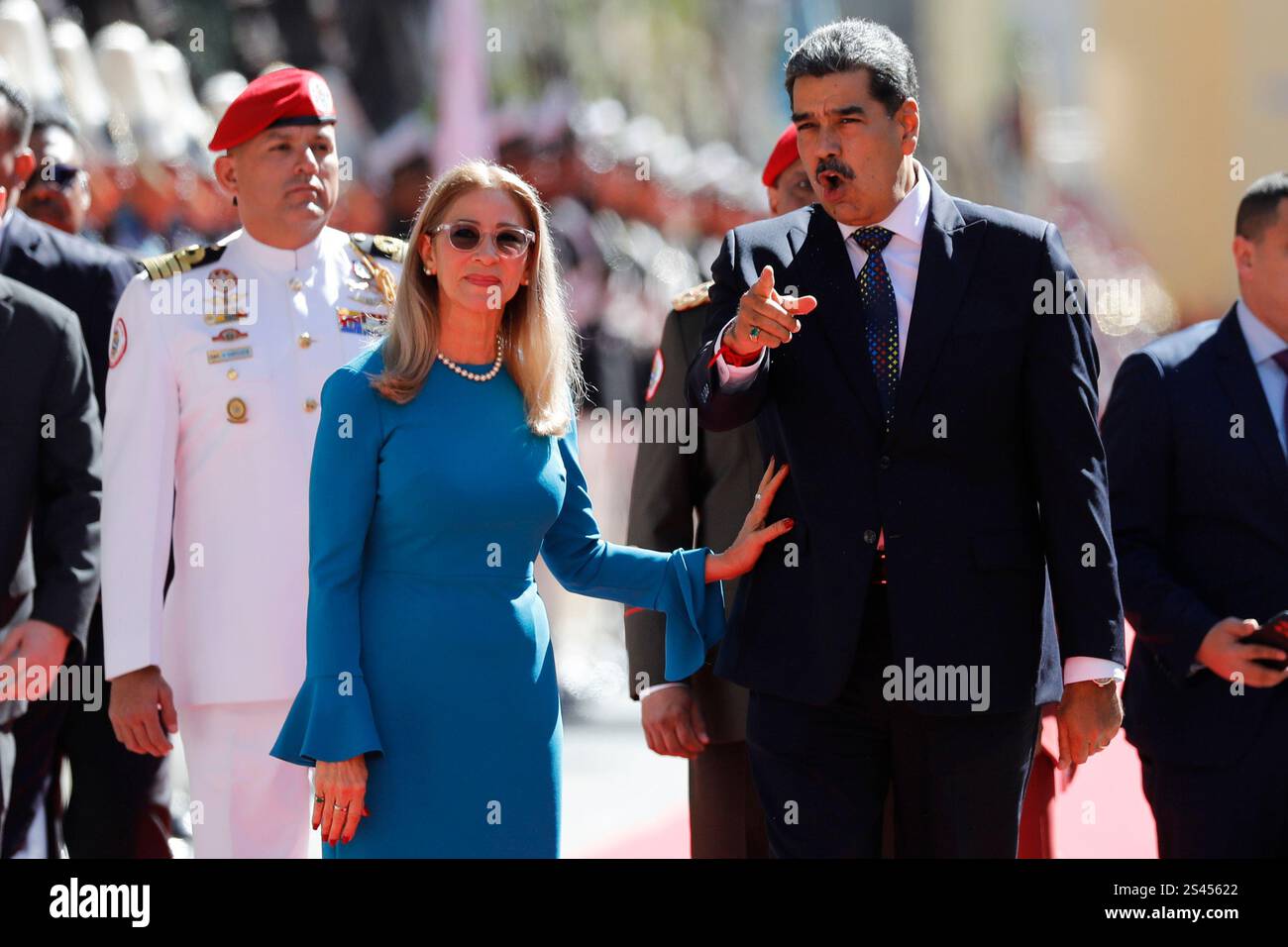 Venezuelan President Nicolas Maduro and his wife Cilia Flores arrive at