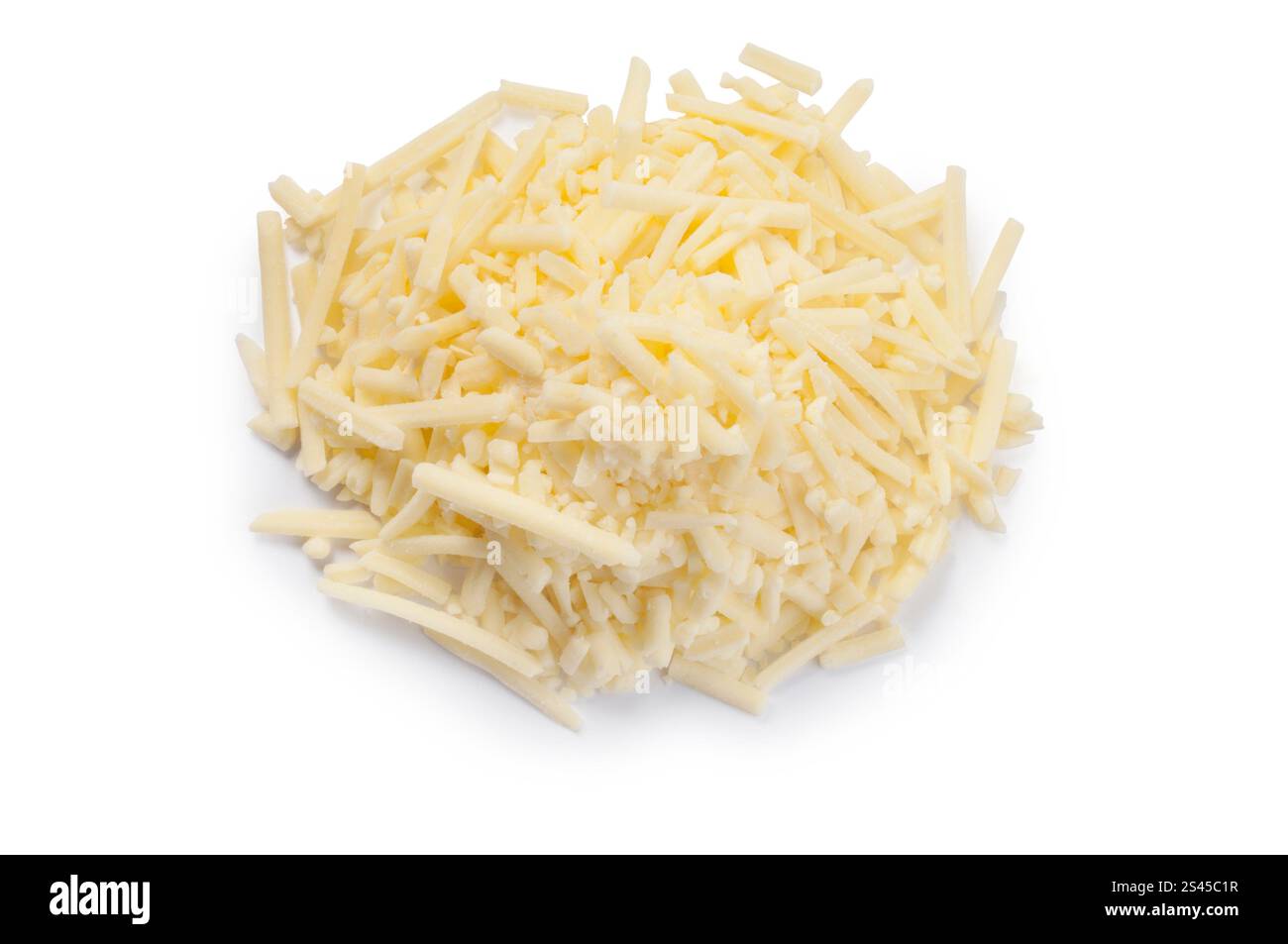 Studio shot of a pile of grated cheddar cheese cut out against a white background - John Gollop Stock Photo