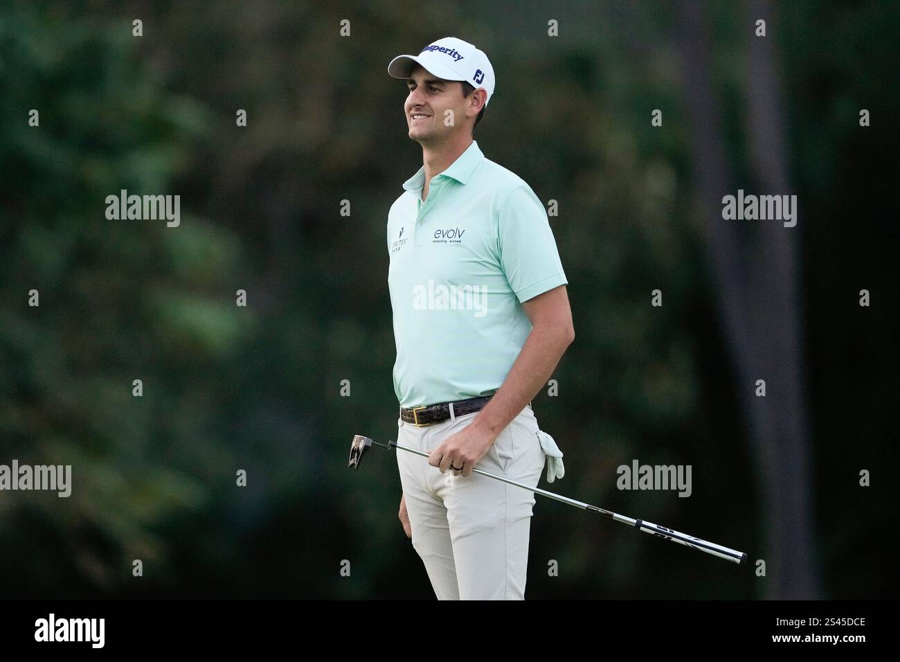 Mac Meissner watches his shot on the 10th hole during the second round