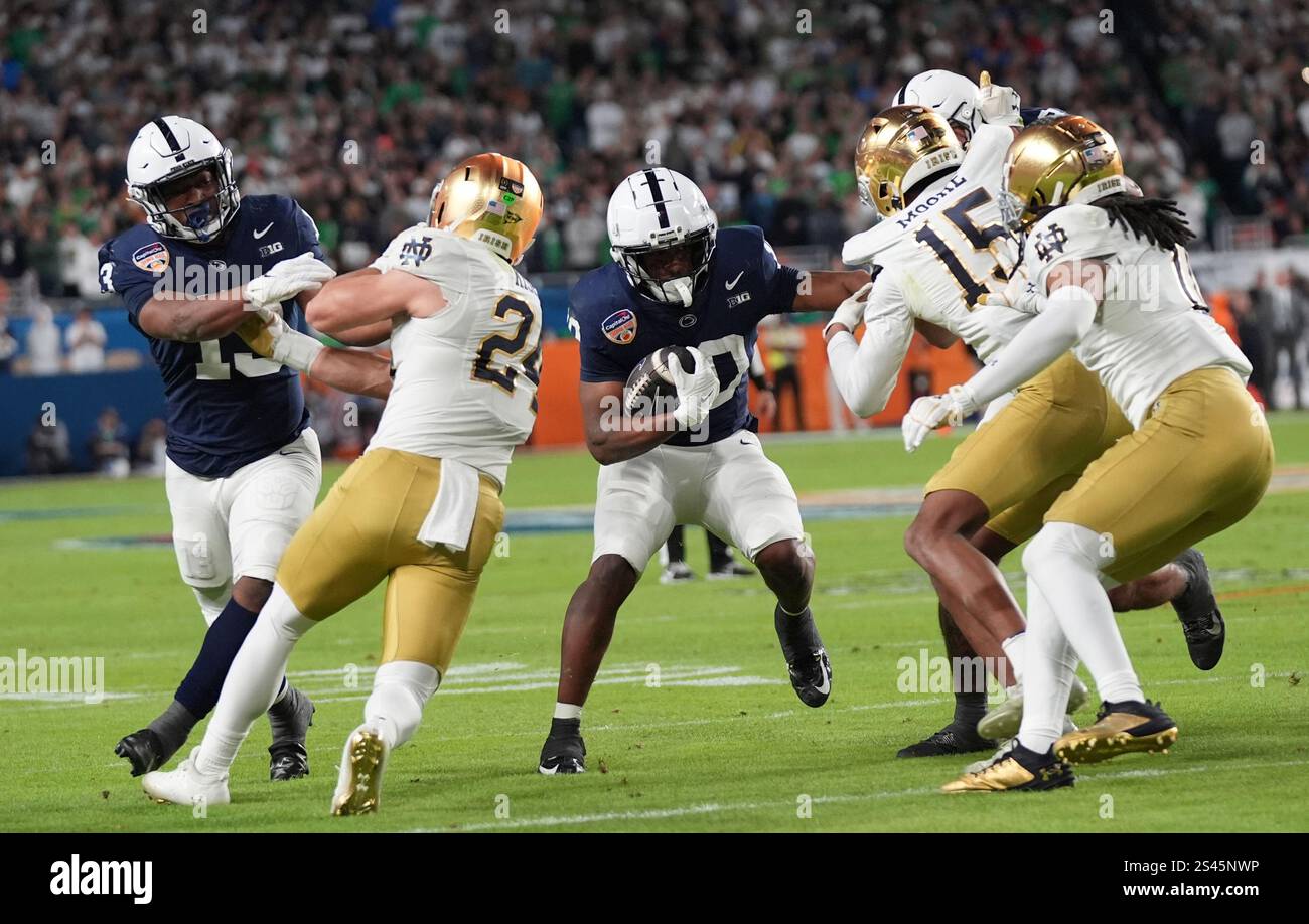 Penn State running back Nicholas Singleton (10) runs during first half