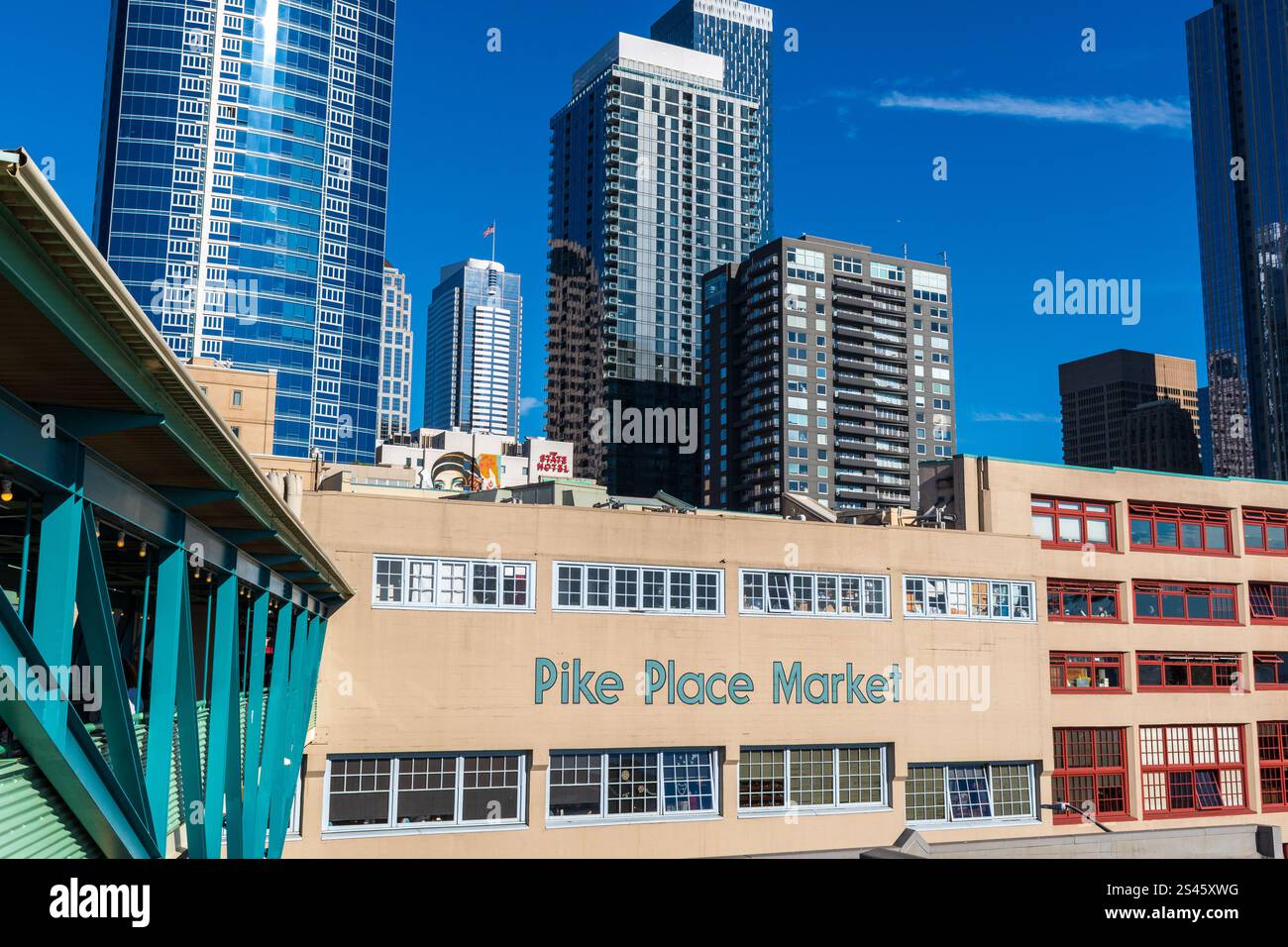 Seattle, WA / USA - 06 Oct 2024: Seattle's Pike Place Market seen on a sunny day with skyscrapers in the distance. Stock Photo