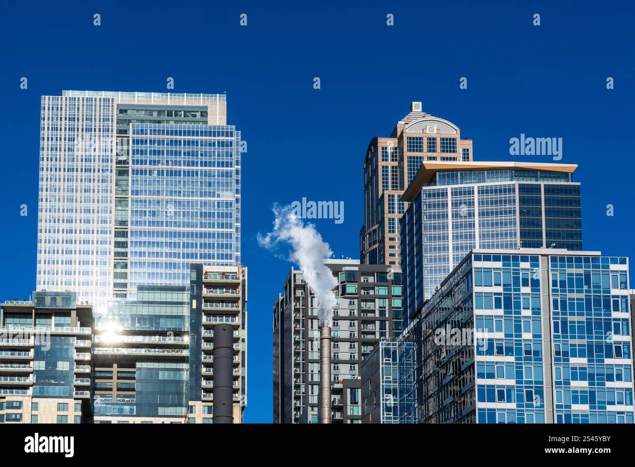 Seattle, WA / USA - 06 Oct 2024:  Skyscrapers of Seattle's skyline on a blue, cloudless, sunny day. Stock Photo