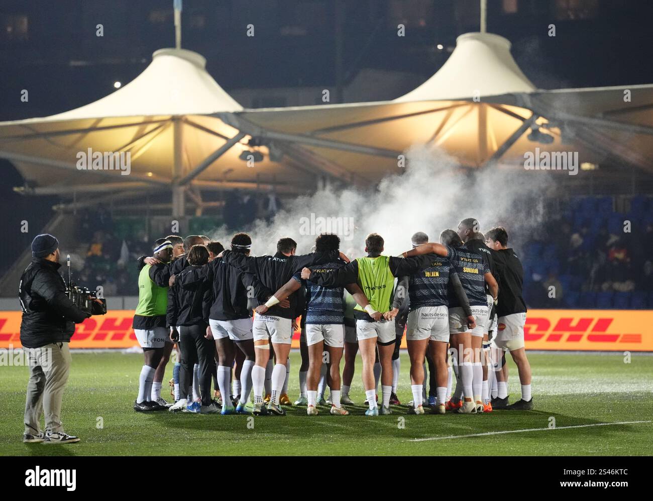 Racing 92 players huddle ahead of the Investec Champions Cup match at