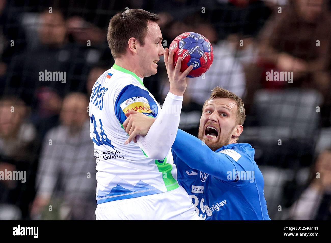 Zagreb, Croatia. 10th Jan, 2025. Rok Ovnicek of Slovenia is challenged ...
